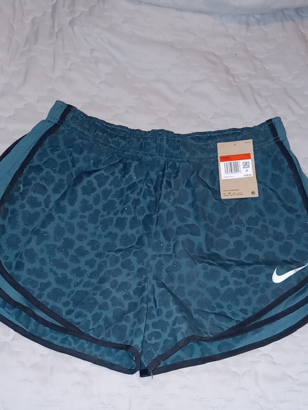 Nike Women's Teal Leopard-Print Athletic Shorts